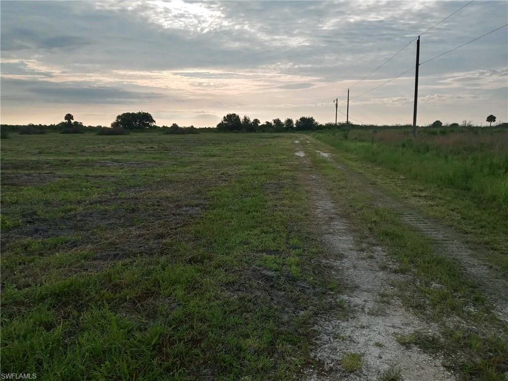 46310 Neal Road Punta Gorda, FL 33982 - Photo 17 of 18 View of 46310 Neal Rd on left. FPL Power pole on right