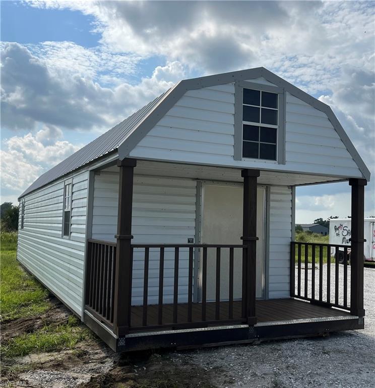 46310 Neal Road Punta Gorda, FL 33982 - Photo 4 of 18 Front view of 12x40 Shed with front porch
