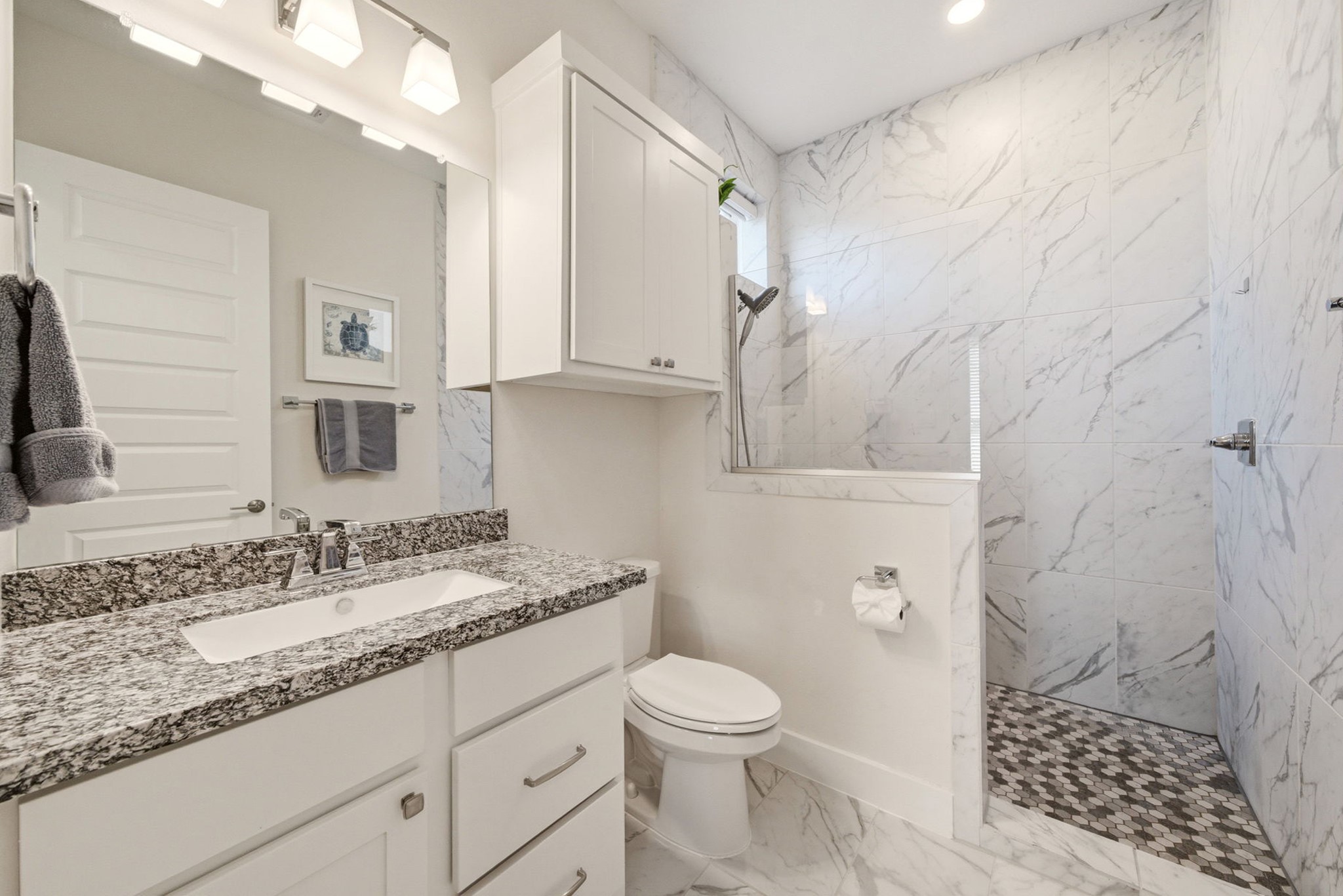 28811 Ember Crest Lane Fulshear, TX 77441 - Photo 12 of 47 a bathroom with a granite countertop sink toilet and shower