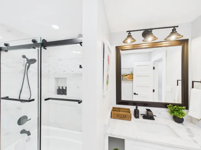 a bathroom with a sink and a mirror