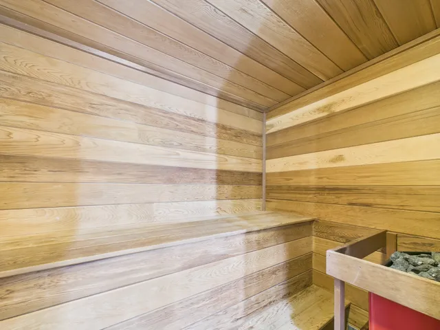 a bathroom with a bathtub and sink