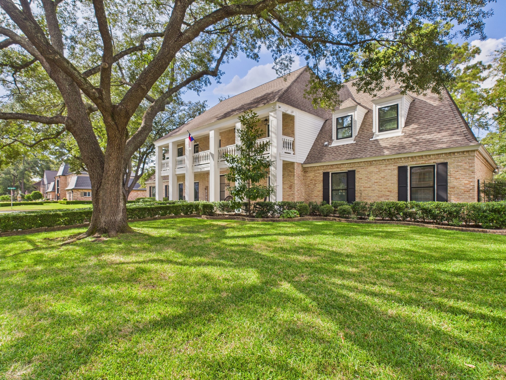 5430 Havenwoods Drive Houston, TX 77066 - Photo 49 of 50 a front view of a house with a garden