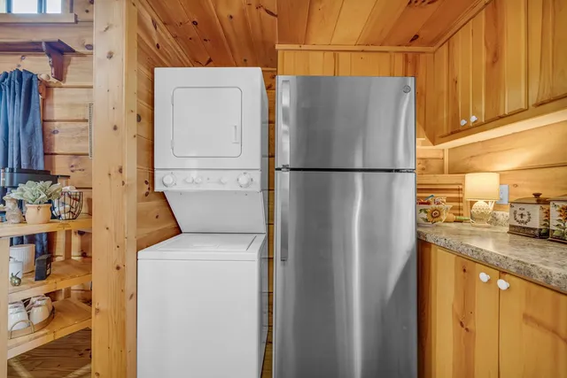 a white refrigerator freezer sitting in a kitchen