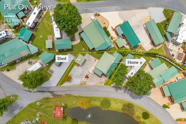 an aerial view of a houses with swimming pool