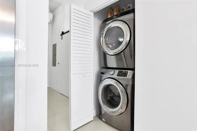a utility room with dryer and washer