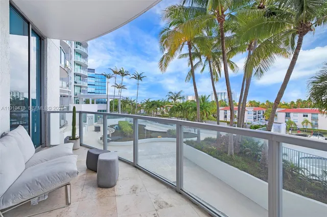 a view of balcony with furniture
