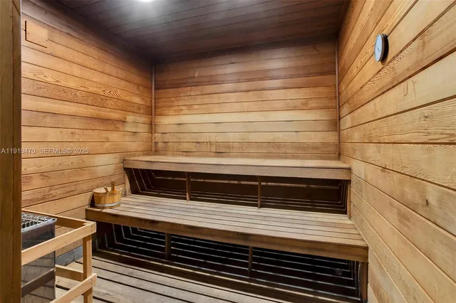 a view of swimming pool with a table and chairs
