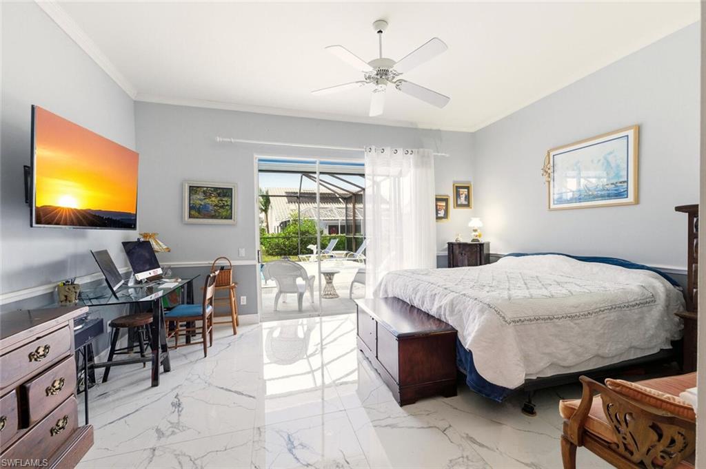 209 Countryside Drive Naples, FL 34104 - Photo 21 of 50 Bedroom featuring access to exterior, ceiling fan, crown molding, and light marble finish flooring