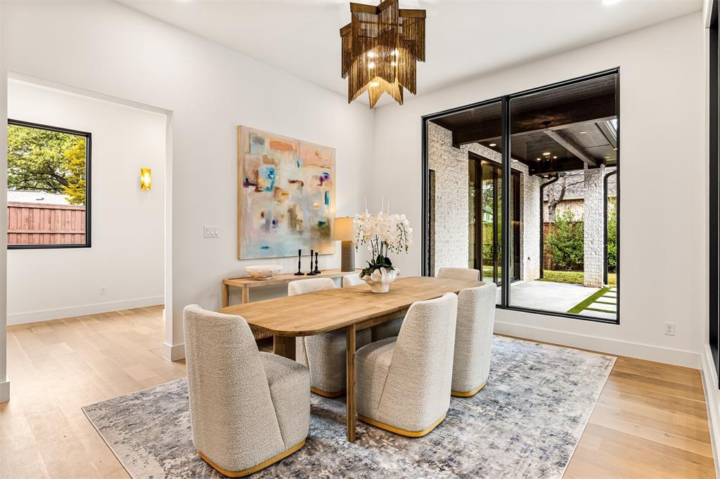 6123 Northaven Road Dallas, TX 75230 - Photo 14 of 40 The dining area sits comfortably next to the kitchen and living room, making it easy to host everything from casual dinners to larger gatherings without feeling tucked away