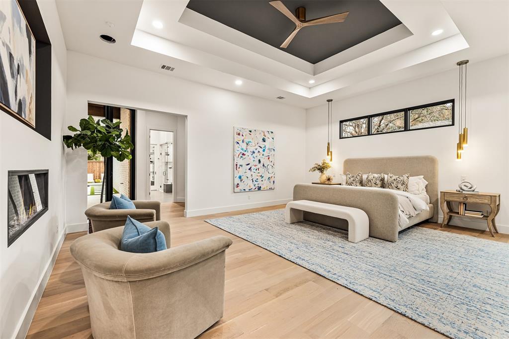 6123 Northaven Road Dallas, TX 75230 - Photo 20 of 40 The primary bedroom is spacious and private, offering a calm retreat with room for a full bedroom setup