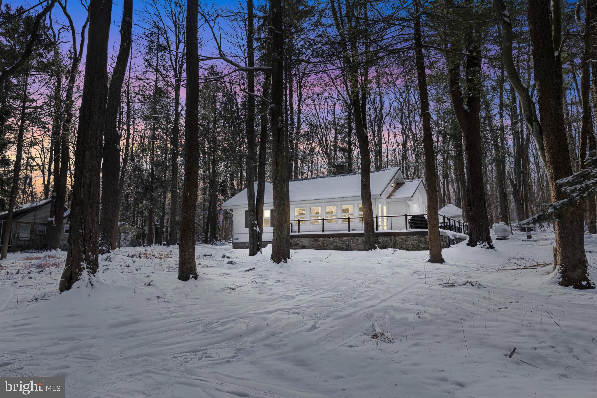 a view of snow on the road