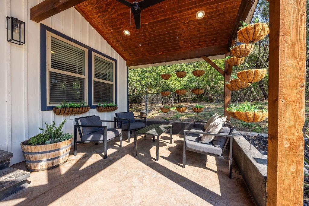 384 Ft Graham Road Waco, TX 76705 - Photo 22 of 36 Covered outdoor patio with a stained wood ceiling and recessed lighting