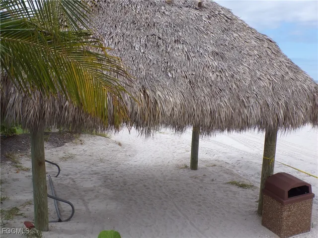 a view of small yard with wooden fence