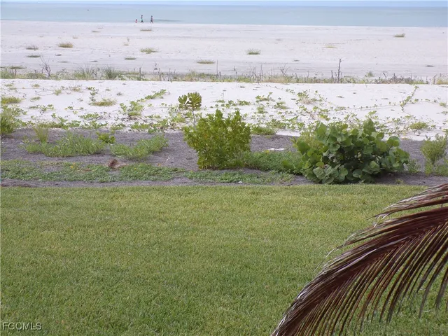 a kitchen with stainless steel appliances granite countertop a refrigerator sink and cabinets