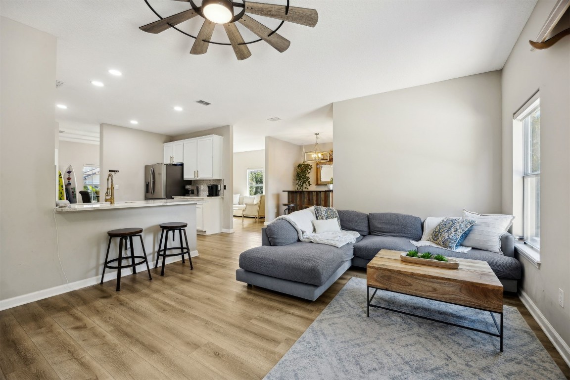 86126 Remsenburg Drive Fernandina Beach, FL 32034 - Photo 13 of 54 a living room with furniture and kitchen view