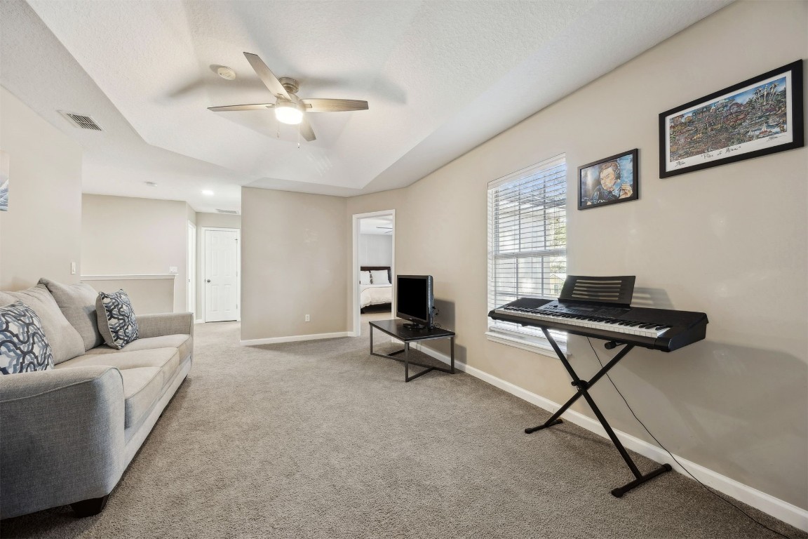 86126 Remsenburg Drive Fernandina Beach, FL 32034 - Photo 19 of 54 a living room with furniture and a rug