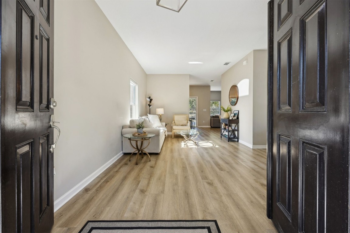 86126 Remsenburg Drive Fernandina Beach, FL 32034 - Photo 2 of 54 a living room with furniture and a wooden floor