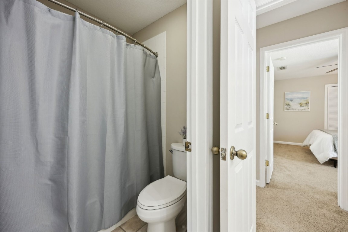 86126 Remsenburg Drive Fernandina Beach, FL 32034 - Photo 22 of 54 a bathroom with a toilet and a shower
