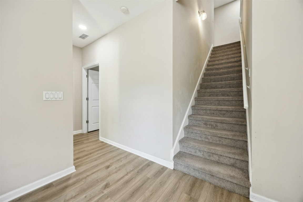 86126 Remsenburg Drive Fernandina Beach, FL 32034 - Photo 24 of 54 a view of entryway and hall with wooden floor