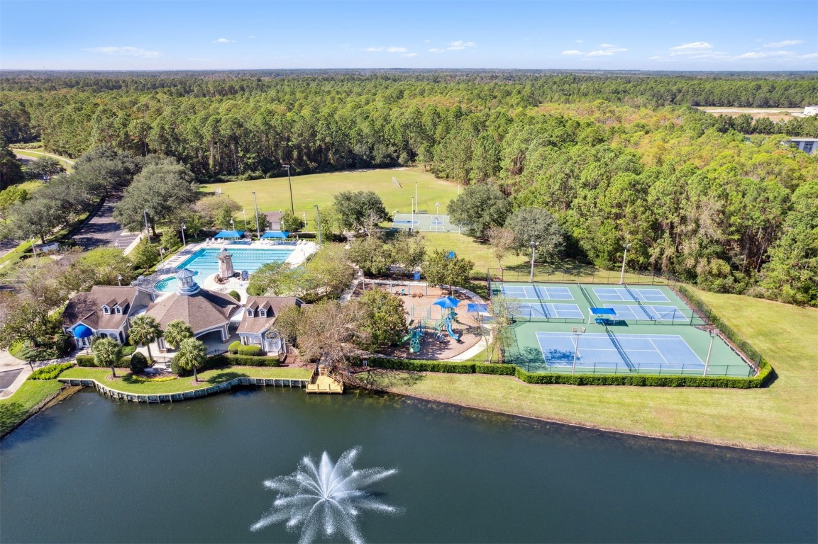 86126 Remsenburg Drive Fernandina Beach, FL 32034 - Photo 46 of 54 a view of a swimming pool with an outdoor seating