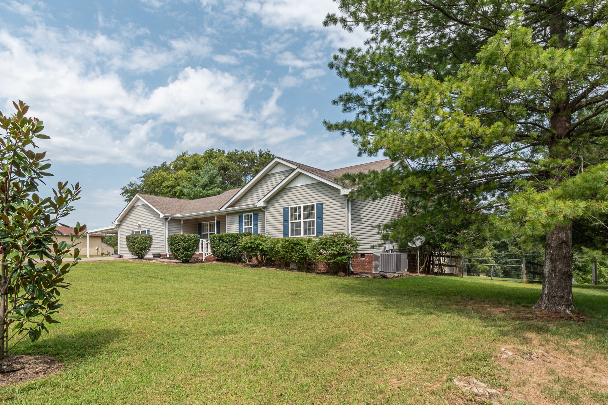 169 Cave Springs Road Lebanon, TN 37087 - Photo 22 of 24 a front view of a house with a yard