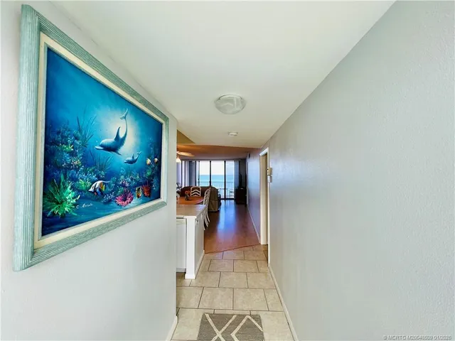 a view of livingroom with furniture and floor to ceiling window