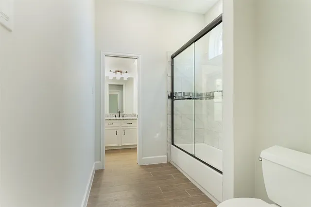 a view of a brick house with a large windows