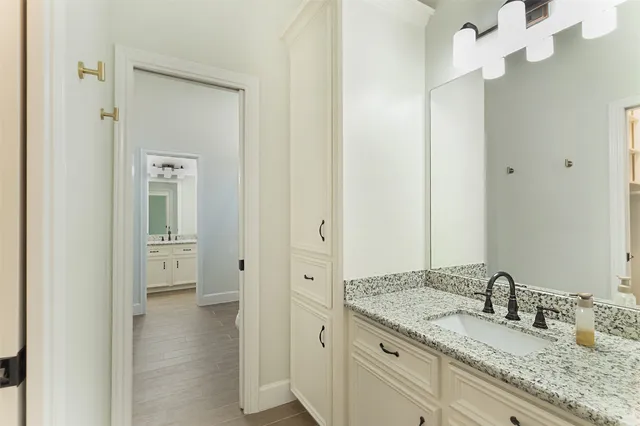 a view of a house with backyard sitting area and garden