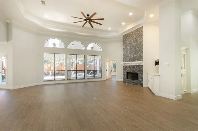 a kitchen with kitchen island a sink stainless steel appliances and cabinets