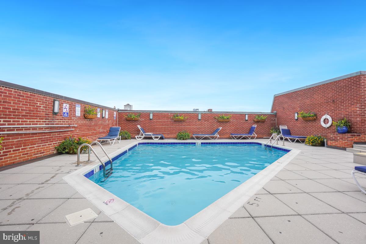 1080 Wisconsin Avenue Northwest, Unit 3002 Washington, DC 20007 - Photo 29 of 38 swimming pool view with a outdoor space