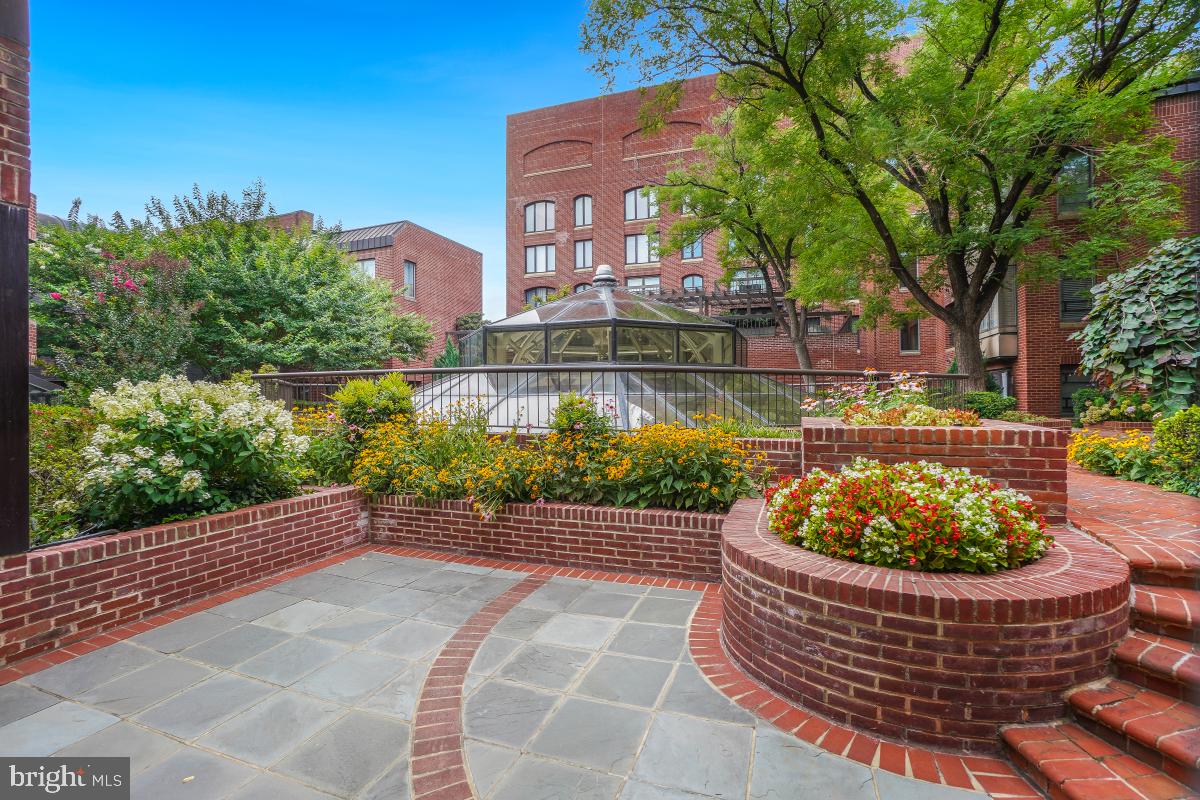 1080 Wisconsin Avenue Northwest, Unit 3002 Washington, DC 20007 - Photo 31 of 38 a view of a porch with a patio