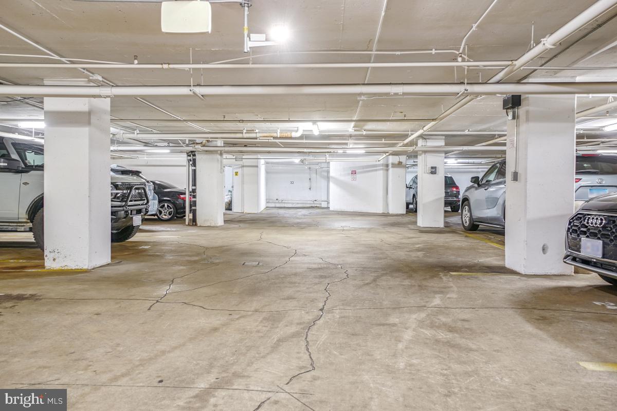1080 Wisconsin Avenue Northwest, Unit 3002 Washington, DC 20007 - Photo 33 of 38 a view of a garage with wooden cabinets