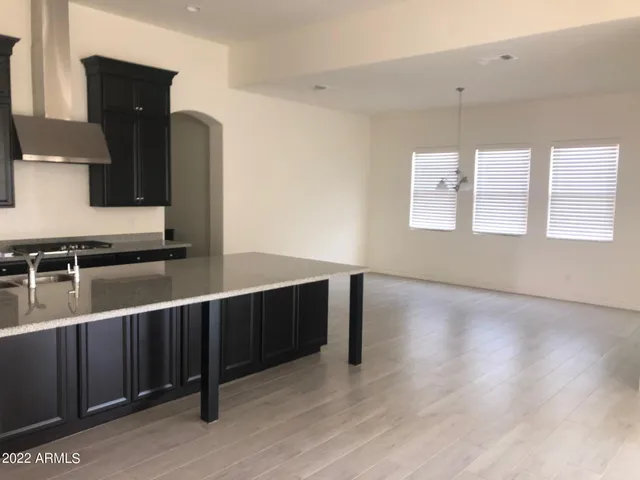 a view of cabinets with wooden floor