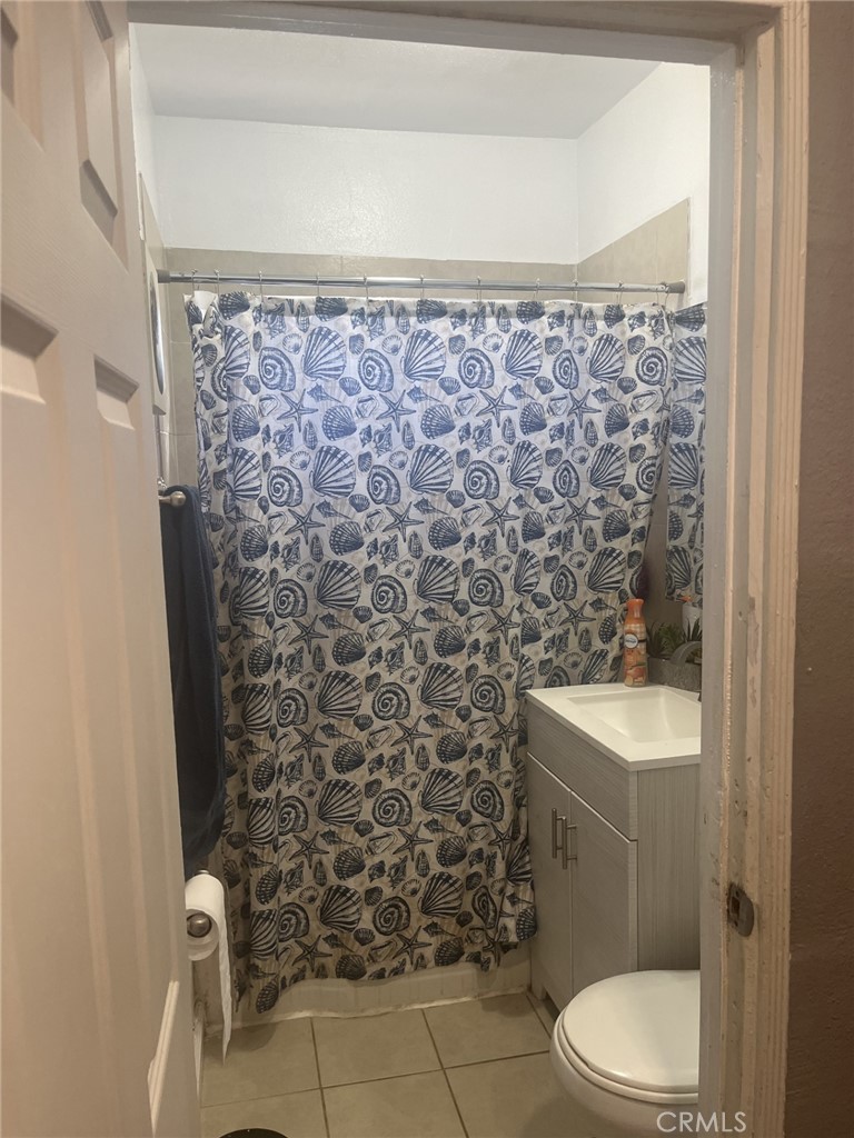 4264 Victoria Avenue Riverside, CA 92507 - Photo 11 of 11 a bathroom with a toilet and a shower