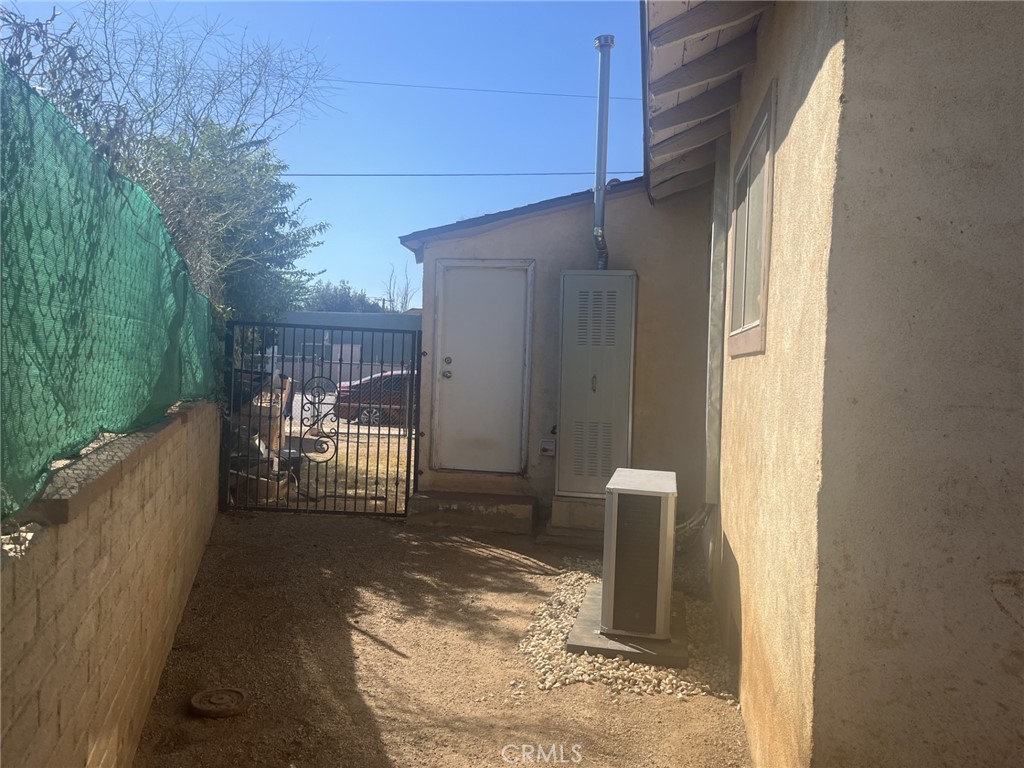 4264 Victoria Avenue Riverside, CA 92507 - Photo 3 of 11 a view of a porch with a floor to ceiling window