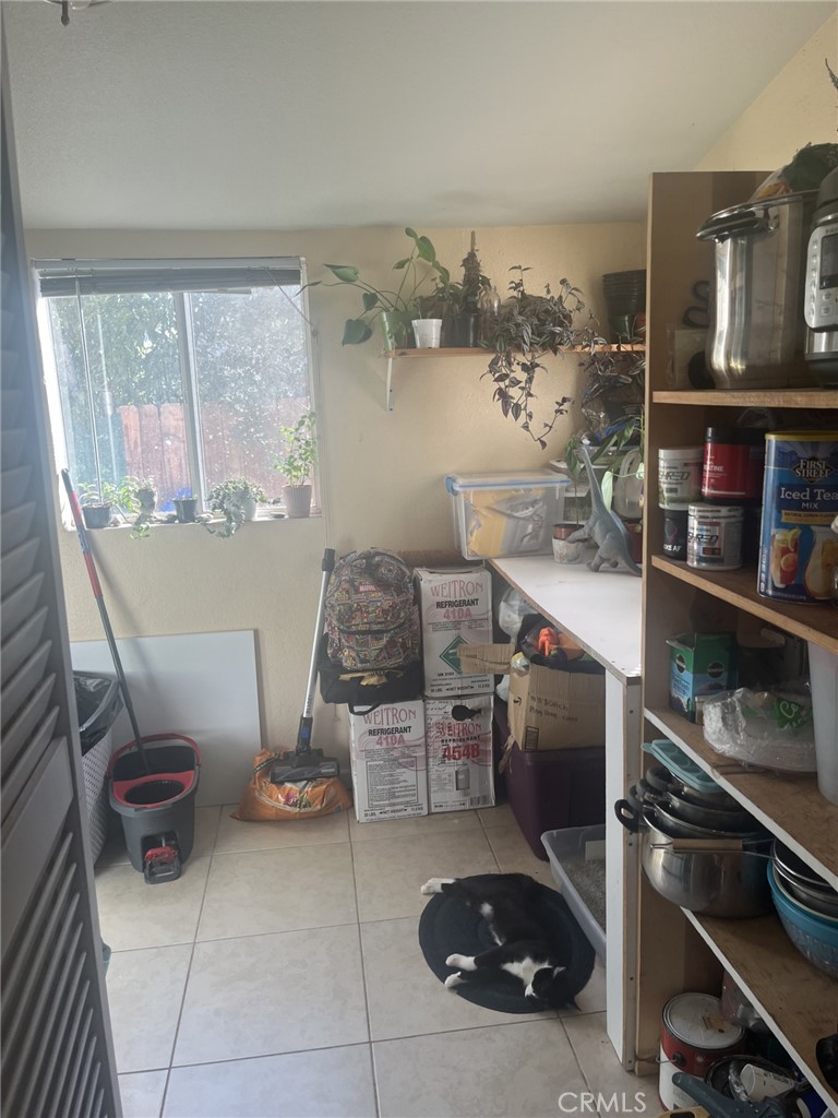 4264 Victoria Avenue Riverside, CA 92507 - Photo 9 of 11 a room with storage and utility