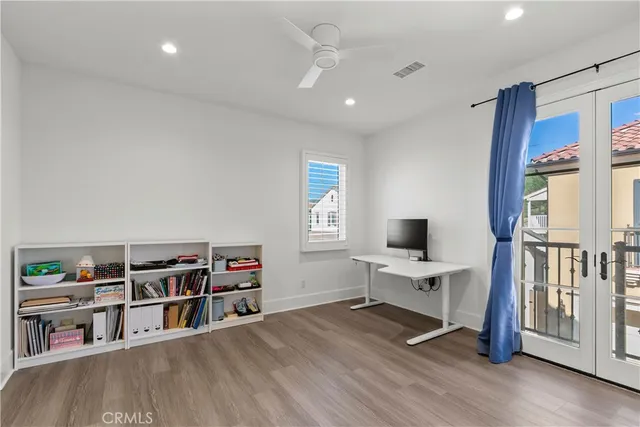 a room with furniture and a wooden floor