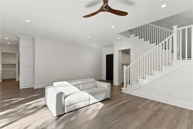 a view of a livingroom with a staircase