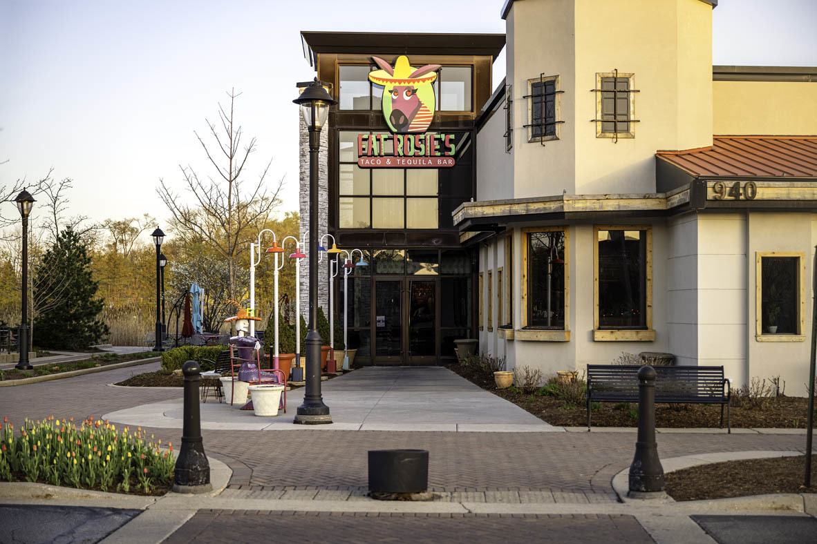 585 Yosemite Way Mundelein, IL 60060 - Photo 37 of 59 a front view of a building with street view