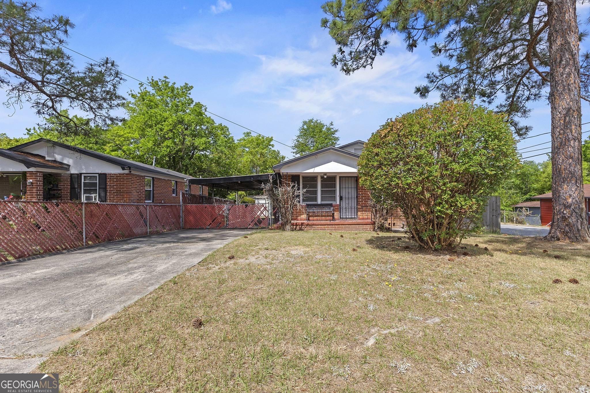 701 Grayson Avenue Macon, GA 31204 - Photo 2 of 17 a view of a house with a tree in the background