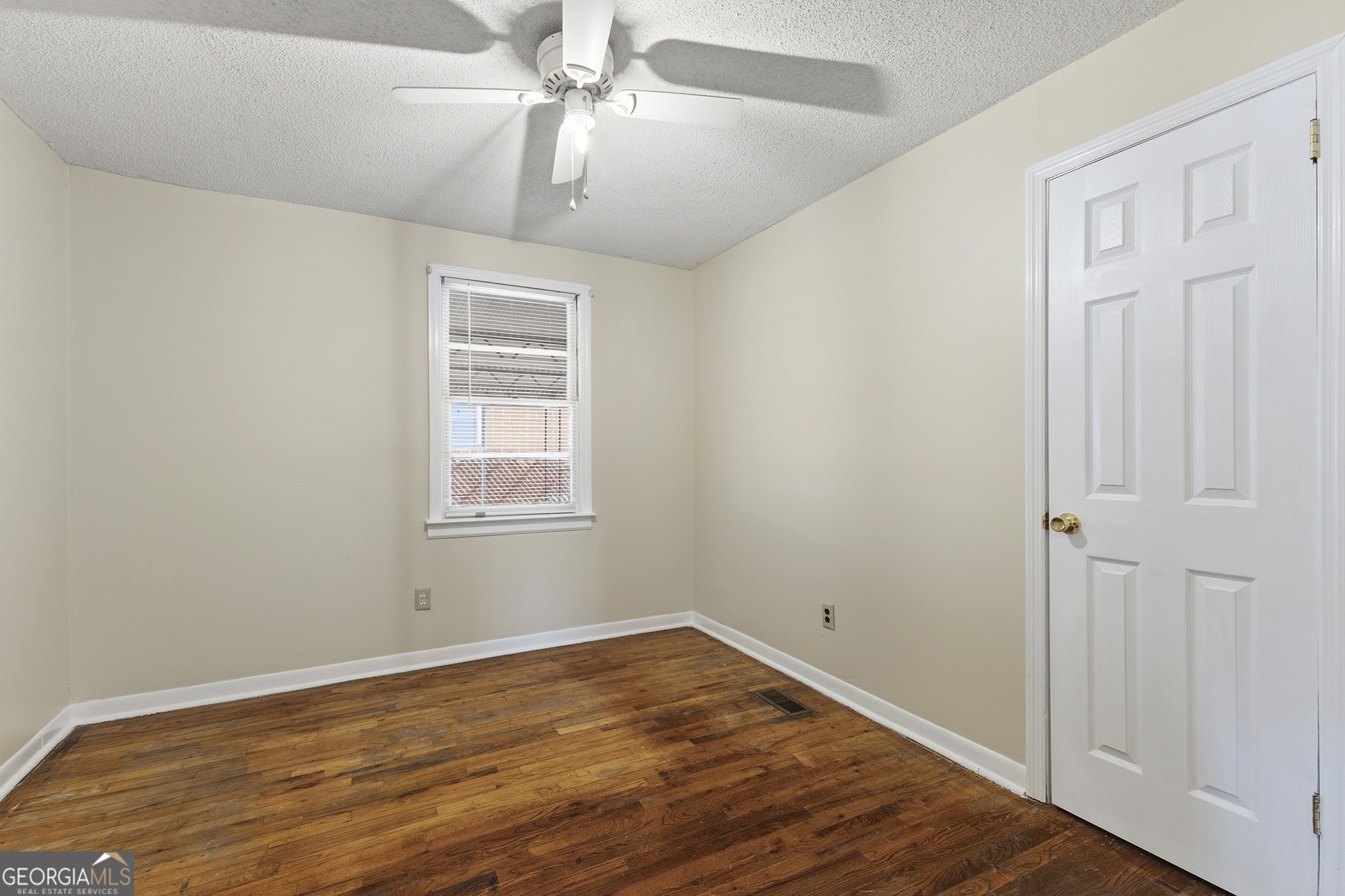 701 Grayson Avenue Macon, GA 31204 - Photo 9 of 17 a view of empty room with wooden floor