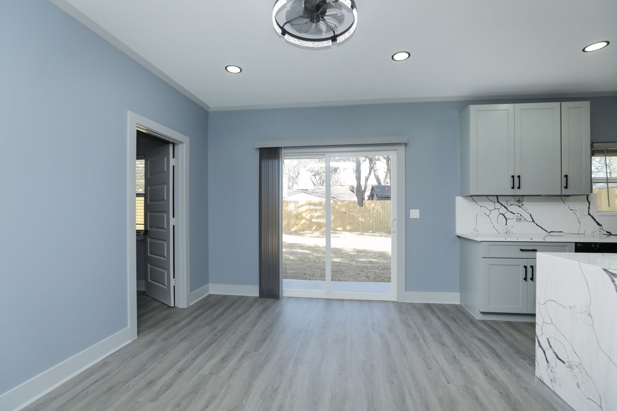 4047 Juliet Street Houston, TX 77087 - Photo 18 of 38 a view of a kitchen with wooden floor and a sink