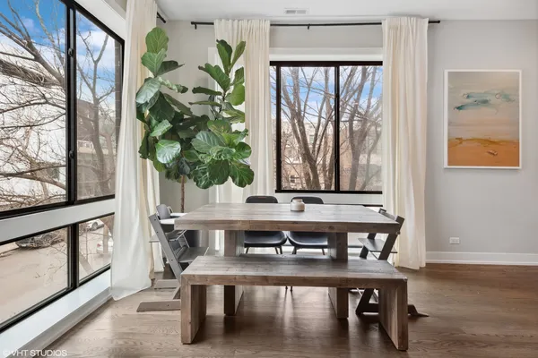a view of a chairs and table in a room