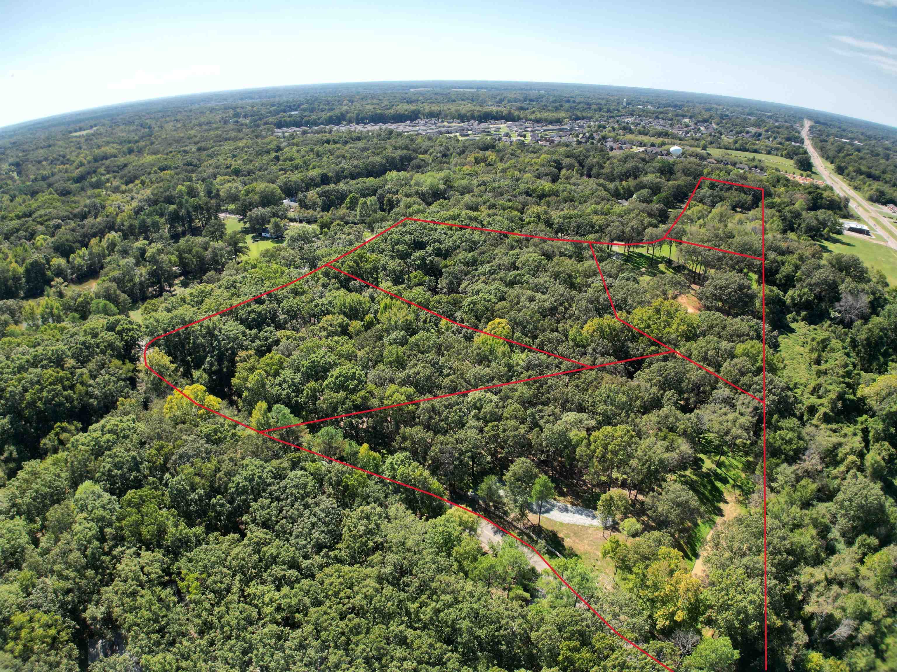 1 Dogwood Road Somerville, TN 38068 - Photo 5 of 7 an aerial view of residential houses with outdoor space and trees