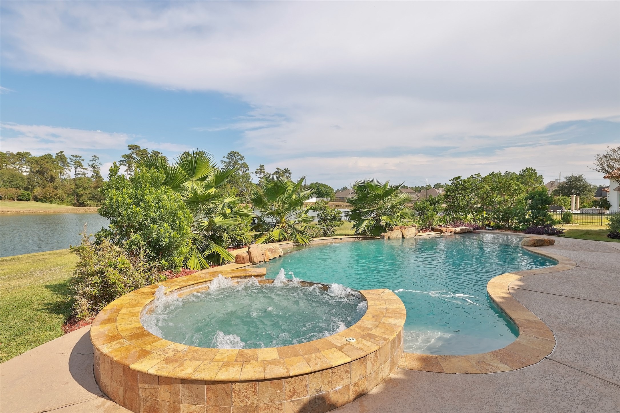 22 Post Shadow Estate Drive Spring, TX 77389 - Photo 12 of 50 a view of a lake in middle of the town