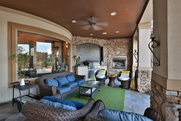 a lobby with furniture and a potted plant