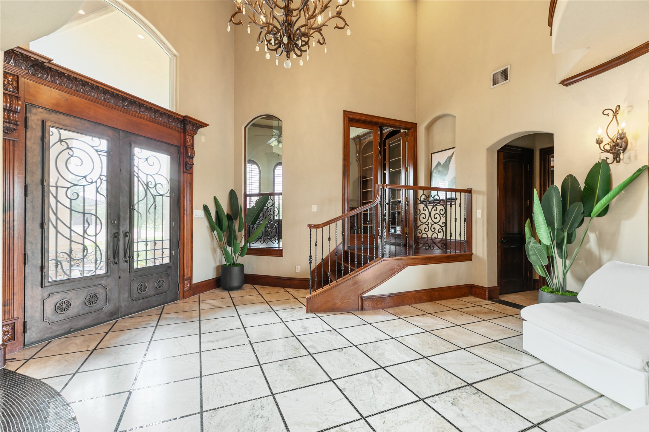 22 Post Shadow Estate Drive Spring, TX 77389 - Photo 17 of 50 Stunning entrance with beautiful chandelier and front doors. Welcome home.