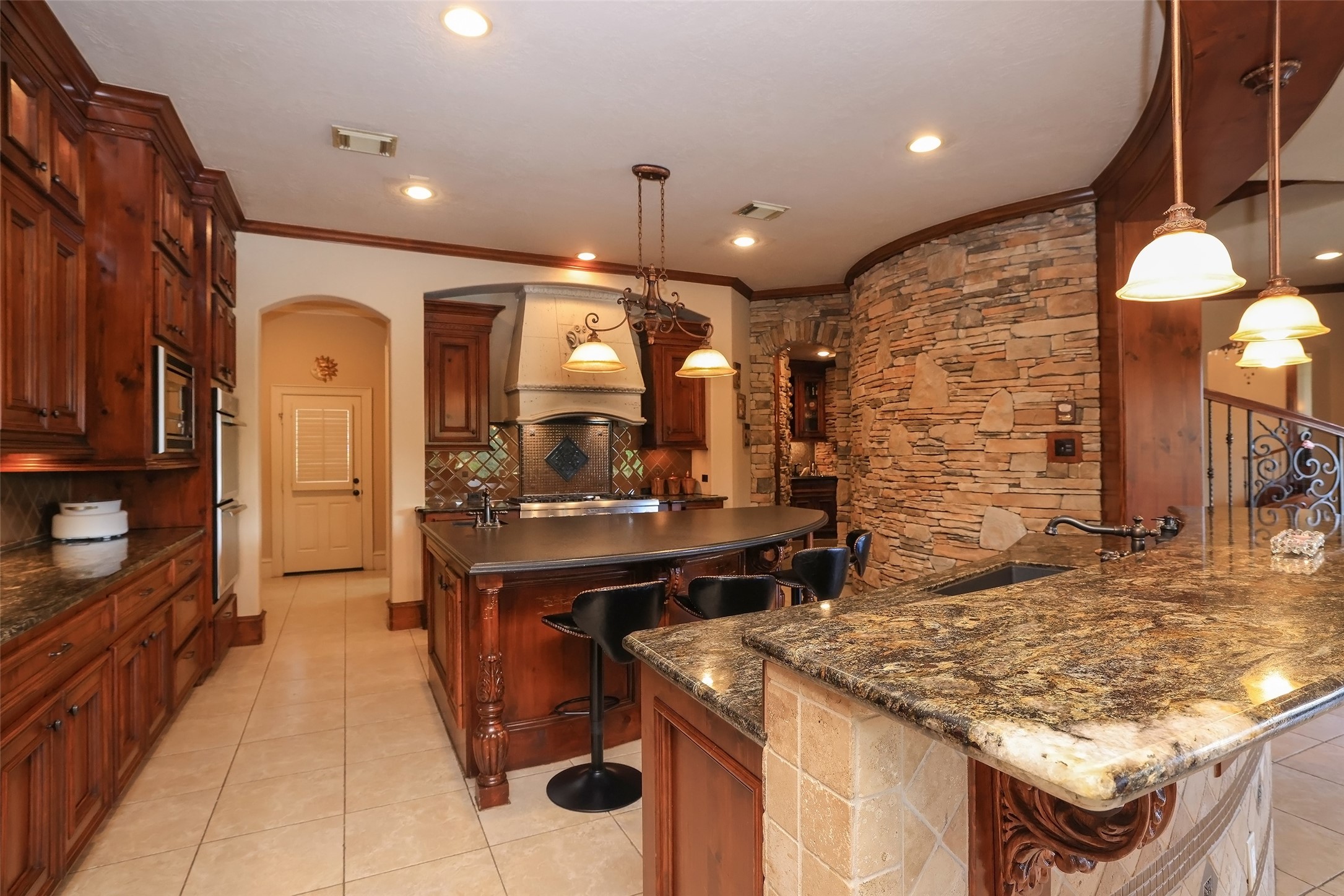 22 Post Shadow Estate Drive Spring, TX 77389 - Photo 18 of 50 a kitchen with a sink and cabinets