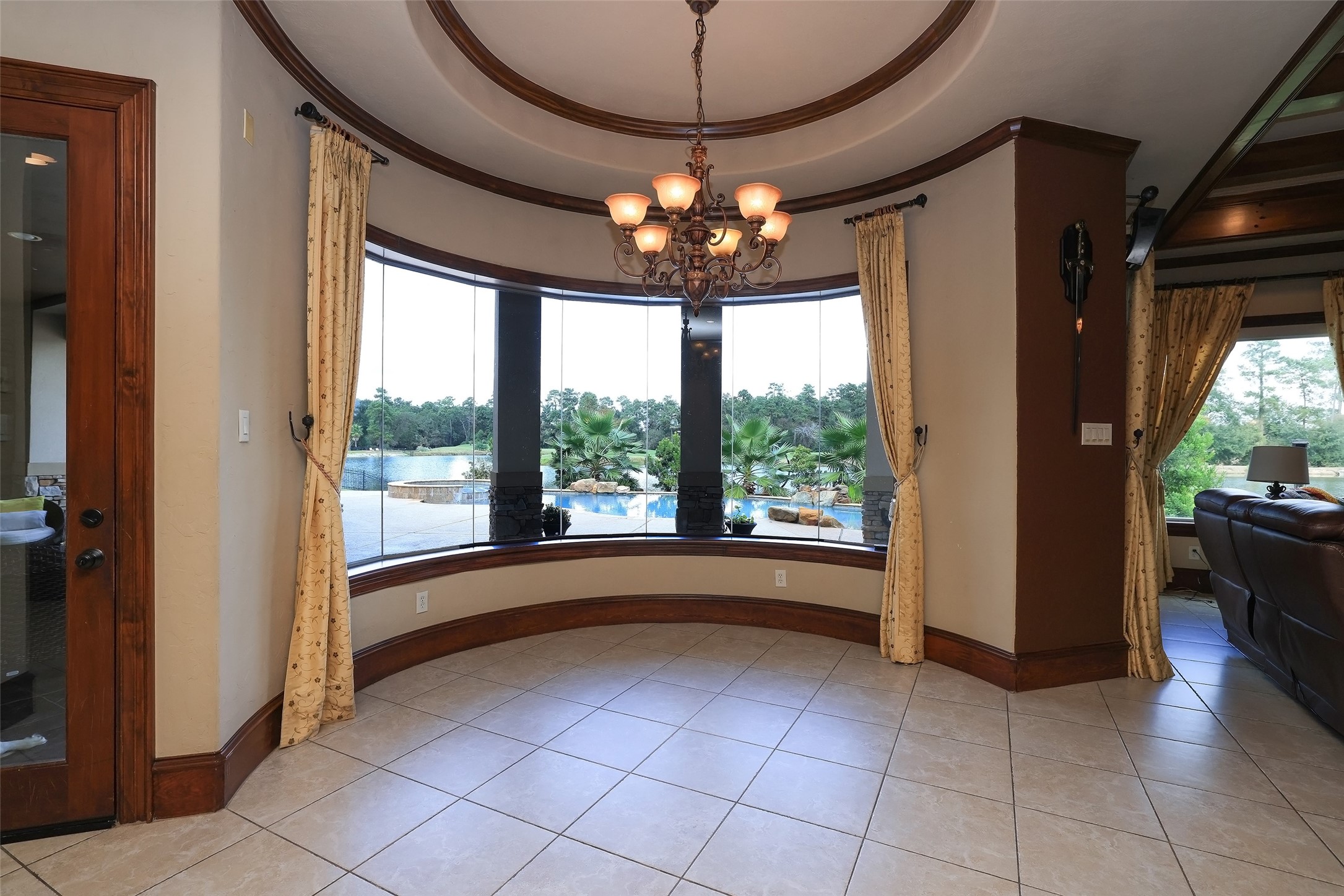 22 Post Shadow Estate Drive Spring, TX 77389 - Photo 24 of 50 a view of a chandelier and window in a room
