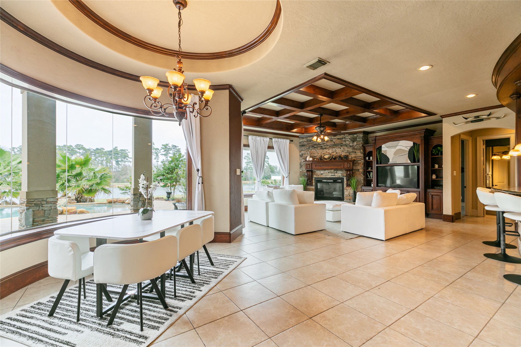 22 Post Shadow Estate Drive Spring, TX 77389 - Photo 24 of 50 Phenomenal open space with breakfast area and gorgeous den next to the large open kitchen. Fabulous space for gathering and entertaining.